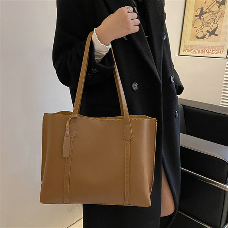 Classic Black Faux Leather Tot - огляд і ціна Leather Work Handbags For Women